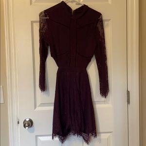 Purple long sleeve romper with back cut out